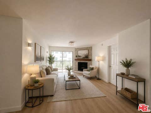 Photo of 21400 Burbank Boulevard #202, Woodland Hills, CA 91367 (MLS # 26892127)