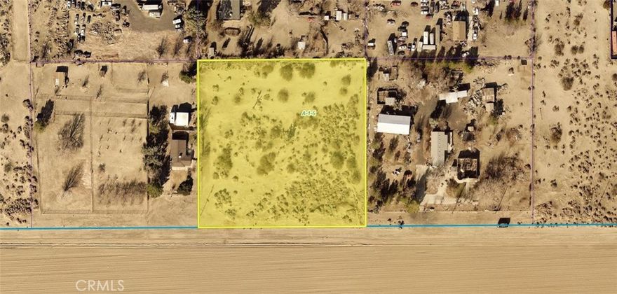 Water and Power in the street fenced on 3 sides and ready for You to make this cleared and level lot the perfect place to build up a property of your liking. Looking for space to have your home, shop, garden, animals and toys all on the same lot, don't wait, this is the opportunity you have been waiting for to start your own Ranch, small orchard, self sustaining property. Approximately 1,200' on dirt road from paved 90th St E. Water meter would need to be installed by local water district. Buyer to verify all utilities.