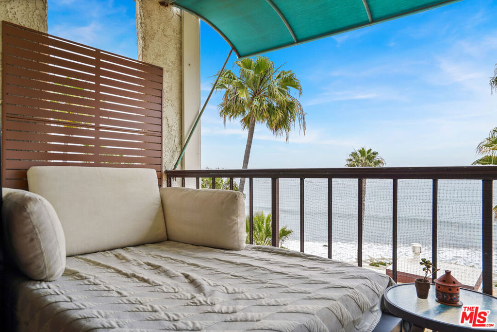Luxuriously lavish and eloquently modernized, this is the crown jewel of the gated beachfront community of Tivoli Cove. Updated in newly renovated, clever construction, this 1-bed, 1-bath condominium boasts bed and balcony panoramic California coastline and Pacific Ocean views, from the Queen's Necklace & Catalina to Point Dume and the blue beyond. This unique home is fully furnished with bedframe/mattress, television, two coaches with coffee table, barstools, dining room table with four chairs, a central island with two chairs, dishwasher, Viking refrigerator and oven, and balcony furniture. Among the upgraded amenities, there are four spacious storage cabinets above two designated covered parking spaces with two Tesla electric vehicle charging ports (able to charge two cars simultaneously; charger ports are adaptable to other manufacturers). Located in prime Malibu, the resort-style association luxuries include a workout room, a sauna, two tennis courts, a community clubhouse, a pool & spa, beach volleyball nets, and a picnic area with bbq's. Convenient to Pepperdine University, local fares, fabulous favorites, and all points Malibu. Levitate to the beach in just moments, enjoying eggs over ocean views with legendary surfside sunrises and sunsets and just a hint of sea salt. Listing photos are not representative of current condominium furnishings. Available August 1, 2025, fully furnished or unfurnished. Optional storage for an extra fee. ~*~