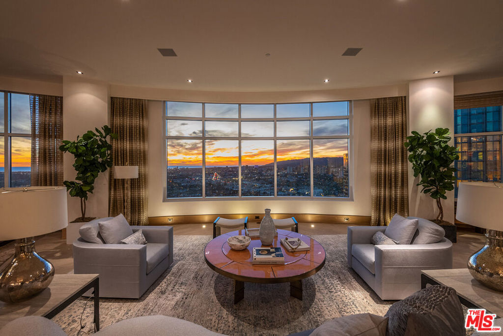 "Above it all." One of the finest Penthouses in Los Angeles. Designed by Robert A.M. Stern with interiors by renowned designer Joan Behnke. Gracing an entire half floor at The Century. Almost 360-degree panoramic views from the Hollywood Hills to the Pacific Ocean to Downtown. Over 6,000 sq.ft. of tailored elegance. Features include: apx. 1,850 sq.ft. living room opening onto two large entertaining terraces, gracious formal dining, custom gourmet kitchen, 2 ensuite guest rooms, and direct access private elevator. Sumptuous master suite with lacquered zebra wood library, dual bathrooms and large showroom walk-in closets. A double-sided glass wine cellar, soaring ceilings and explosive views from nearly every room complete this unrivaled penthouse. The Century includes world class amenities and is considered one of the finest residential high rises in Los Angeles. A rare offering shown only to prequalified clients.