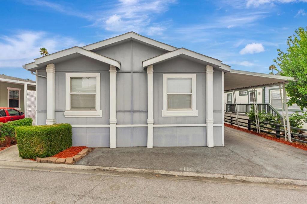 Beautifully maintained 1998 Golden West home located in the sought-after Town & Country Mobile Home Park in San Joses Blossom Hill neighborhood. This 55+ senior community offers a peaceful and convenient lifestyle. This spacious 1,782 sq ft home features 3 bedrooms and 2 bathrooms and is move-in ready. Enjoy modern upgrades including updated bathrooms, laminate flooring, double-pane windows, and an updated kitchen with granite countertops and tall ceilings. The expansive primary suite boasts a walk-in closet, soaking tub, separate shower, and dual sinks. Additional features include central A/C for year-round comfort. Perfectly situated near shopping centers, restaurants, Oakridge Mall, and major highways, this home offers comfort, convenience, and a relaxing lifestyle.