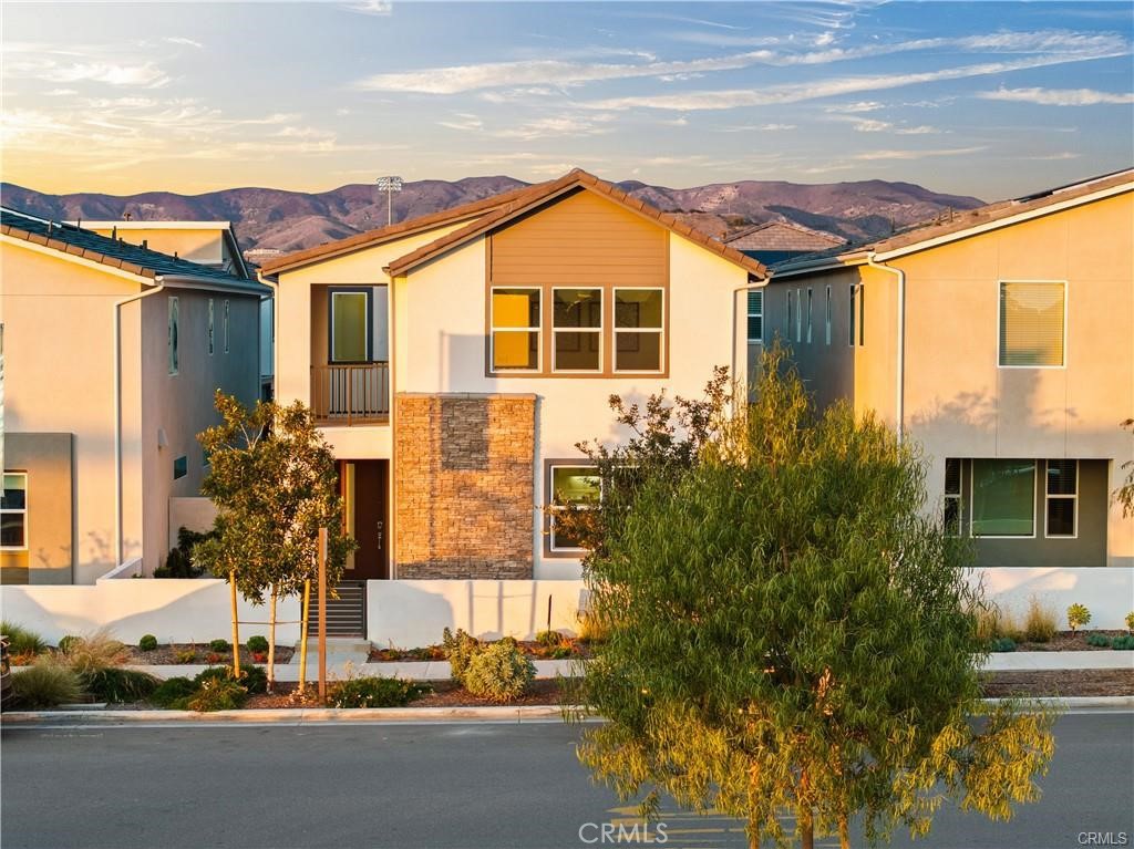 Welcome to this 2023 built 2266 sqft detached house, located in the highly sought-after Irvine Great Park neighborhood at Solis Park. This stunning property boasts an open floor plan, allowing for seamless flow throughout the living and dining areas, South face, plenty of natural light and modern finishes throughout. This is also the most popular floor plan in the Community! The first floor has an open and spacious design, and the gourmet kitchen includes great features like white cabinetry, a thick quartz counter with stainless appliances and the built-in Refrigerator are already there! This home has storage area in the garage as well as generous storage inside. This beautiful home also features a gorgeous owner's suite with a spa like bathroom. Standard Loft on second floor would perfect for Kids play area or Office. This home has a great location that is within steps of the fantastic Solis Park's The Retreat, a neighborhood park with beautiful resort like pool and jacuzzi with outdoor meeting areas including high-end BBQ and prep areas with beautiful fire pits. Face to Solis Park K-8 school and 5 minutes' walk to Portola High school. Enjoy the resort-like community in the great park in Irvine. MUST SEE.