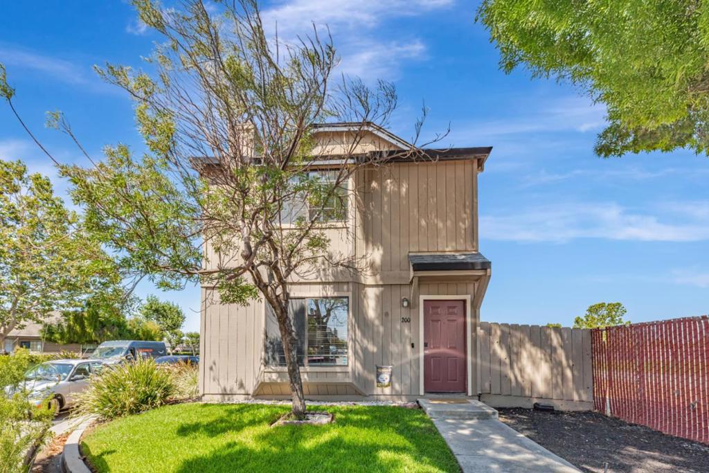 Welcome to your beautifully updated townhome located in the desirable gated community of Gibson Station, right in the heart of Hollister. This charming, standalone unit offers rare privacy with no shared wallstruly a hidden gem! Just minutes from schools, shopping, and major highways, the location couldnt be more convenient. Step inside to find a fully renovated kitchen with sleek cabinetry, stainless steel appliances. The spacious primary bedroom upstairs features a walk-in closet, and large windows that fill the room with natural light. Two additional bedrooms provide flexibility for family, guests, or a home office. A detached two-car garage offers ample space for parking and storage. Community amenities include a clubhouse, childrens playground, and a sparkling in-ground pool and spaperfect for relaxing or staying cool during summer. All of this comes at an excellent valuedont miss the opportunity to make this home yours!