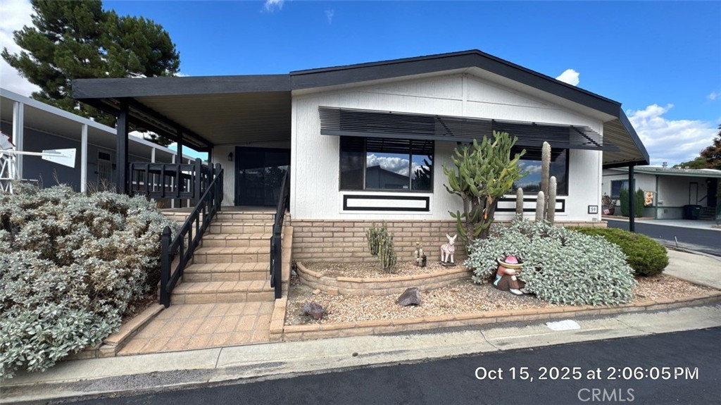 Welcome to this freshly rehabbed and freshly painted corner lot. Step into this bright and spacious triple-wide home nestled in the desirable 55+ community of Heather Estates. Designed for comfort and easy living, this residence features an open-concept living and dining area filled with natural light, a large kitchen with abundant cabinet space, and a cozy breakfast nook perfect for morning coffee. 
The primary suite offers a generous layout with an oversized walk-in closet and private bath, while the additional bedrooms provide flexibility for guests, hobbies, or a home office. Outside, enjoy a covered front porch, low-maintenance landscaping, and a private carport for convenient parking. The home comes with an attached ramp and two additional entrances. 
Heather Estates offers beautifully maintained grounds, a variety of community amenities, and close proximity to shopping, dining, and medical facilities—everything you need for a relaxed and connected lifestyle.
