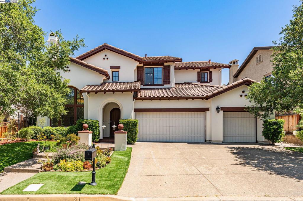 Rare opportunity to own this exceptional two-story single-family home in the prestigious Ruby Hill community of Pleasanton. Bathed in natural light and offering a warm, welcoming atmosphere, this residence is designed for both comfort and style. The spacious primary suite features a walk-in closet, double sink vanity, shower stall, and a separate bathtub, while a convenient full bathroom is located on the ground floor. The home boasts high-quality luxury vinyl wood and tile flooring throughout. The gourmet kitchen is a chef’s dream, complete with stainless steel appliances, sleek cabinetry, a quartz countertop, and a central island. Upstairs, a versatile loft area offers the perfect space for an office, while three generously-sized bedrooms and two additional bathrooms provide ample living space for your family. Step outside to your own private oasis, where you'll find a mini-golf course, BBQ station, pool, and spa, all set against low-maintenance turf grass. Ideally located near the Ruby Hill Country Club with restaurant, pool, fitness center, tennis courts, golf course. This home offers the perfect blend of luxury and convenience. With everything your family needs and more, this opportunity won’t last long!