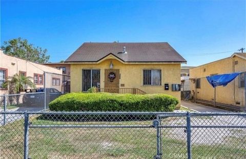 Photo of 822 824 E 87th Pl, Los Angeles, CA 90002 (MLS # CV26006463)