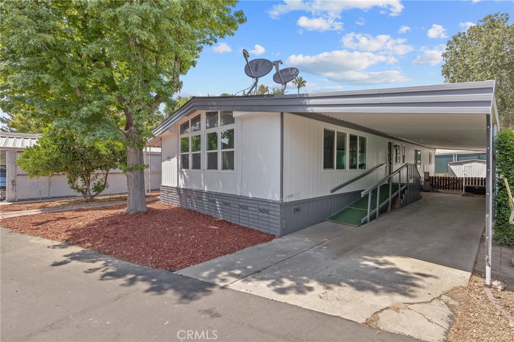 Charming 2-Bed, 2-Bath Home in a Vibrant Senior Community Step into this beautifully updated home, offering an inviting open floor plan with spacious rooms and thoughtful upgrades throughout. The remodeled kitchen features updated appliances, new countertops, and refreshed cabinetry with modern hardware. Enjoy an abundance of natural light streaming through new dual-pane windows, enhancing the warmth and comfort of every space. This home boasts a built-in china hutch, a cozy living room, a versatile family room, a dedicated dining area, and a convenient laundry room. The large primary bath is a retreat in itself, complete with a soaking tub and separate shower. Brand-new laminate flooring and plush carpet add a fresh touch, complemented by stylish new lighting. Nestled in a desirable senior community, this home provides access to resort-style amenities, including a swimming pool, scenic ponds, and recreational areas. Step outside to the covered patio, perfect for enjoying peaceful mornings or relaxing evenings. Don't miss this fantastic opportunity to embrace comfort, convenience, and community living. Reach out today for more details!