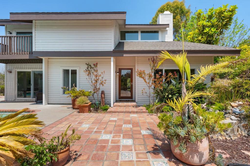 Stunning, spacious single-family home with beautiful views! Located at one of the highest points in La Costa, this home offers wide views of the ocean and hills from nearly every room. It features granite counters, maple cabinets, travertine floors and showers, and KitchenAid appliances. The main bedroom includes two balconies and a retreat space, while a downstairs room can serve as a bedroom, office, or sitting area. New paint throughout, Milgard windows and doors, updated pool system and spa, and a 3-car garage for ample parking complete the home.