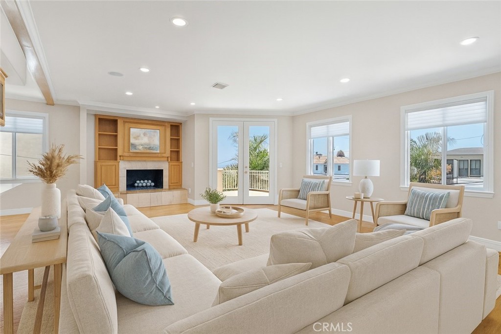 Detached front townhome in a prime Hermosa Beach location. This home combines the space and function of a single-family residence with the convenience of low-maintenance coastal living. Walkable to the beach, shops, and restaurants, with quick access across PCH to the sand, this property offers the perfect blend of lifestyle and value. The interiors are clean, freshly painted, and move-in ready. Updated recessed lighting brightens the living areas, while versatile spaces throughout the home provide room to live, work, and play. With 3 bedrooms plus a dedicated office or 4th bedroom complete with closet, the floorplan adapts easily to your needs. A bonus utility room off the garage and laundry area is ideal for storing beach gear, creating a workout studio, or setting up your choice of a hobby space. Enjoy partial ocean views from the living room and deck, and head up to the private roof deck for panoramic coastline vistas stretching from Palos Verdes to Malibu. This expansive outdoor retreat is perfect for entertaining, relaxing, or taking in Hermosa’s signature sunsets. Although part of a two-on-a-lot with a shared driveway, this front unit offers its own private driveway with two additional parking spaces. This unique feature, paired with the attached 2-car garage, provides ample parking and enhances the feel of a true single-family home. Additional highlights include a light-filled open layout and a location that balances quiet residential living with close proximity to Hermosa’s lively beach scene. Whether as a primary residence or coastal getaway, 944 5th Street offers the best of Southern California living with flexible spaces and inspiring ocean views.