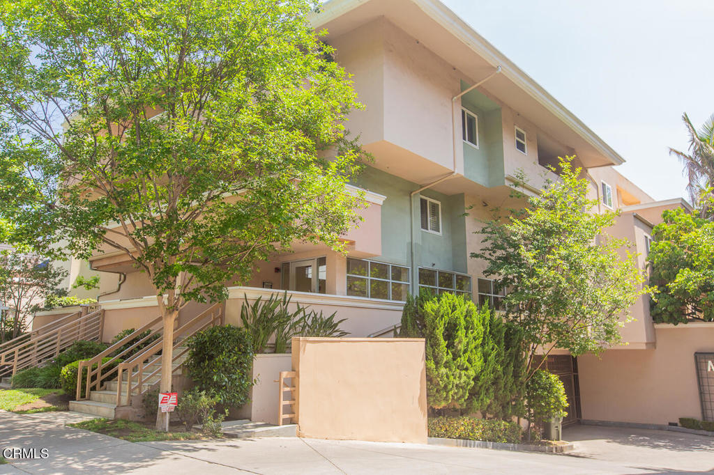 Stylish End-Unit Condo in Prime Pasadena - Tucked away on a serene, tree-lined street just steps from the vibrant South Lake Avenue District, this immaculately maintained end-unit condo offers the perfect blend of comfort, style, and convenience. Enjoy easy access to premier shopping, dining, and entertainment, just minutes from Old Town Pasadena and one block from Lake Avenue. Both the unit and the complex showcase quality craftsmanship and modern updates throughout. The spacious living room features rich hardwood floors, high ceilings, crown molding, a cozy fireplace, and French doors that open to a charming private balcony--ideal for relaxing or entertaining. The gourmet kitchen is outfitted with granite countertops, stainless steel appliances, and a generous dining area. Two large bedrooms each include custom built-in closets and beautifully appointed full bathrooms with contemporary finishes. Additional highlights include wood shutters, in-unit laundry, ample storage, and two full sized subterranean parking spaces. This turnkey home combines elegance, functionality, and a prime location--perfect for those seeking refined urban living in Pasadena.