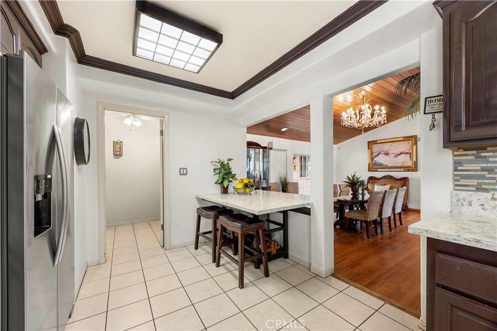 Photo of 9315 Parrot Ave, Downey, CA 90240 (MLS # PW26068671)