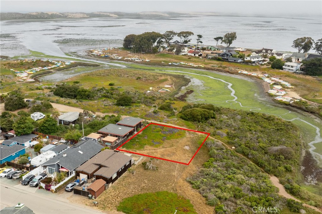 An exceptional opportunity to own a double lot with direct Back Bay frontage in the highly sought-after Cuesta By the Sea neighborhood of Los Osos. Located on Garden Street, this unique property spans approximately 8,000 sq ft and includes two separate APNs, offering flexibility for future development or investment. Enjoy stunning views and serene surroundings just steps from Sweet Springs Nature Preserve and the vibrant community of Baywood with its weekly farmers market, dining, and coastal charm. This lot is currently #98 on the San Luis Obispo County building list, positioning it well for future building potential. Embrace the best of Central Coast living with this one-of-a-kind bayfront property. Easy access for Kayaking in the back bay. Buyer to verify building potential and permit requirements with San Luis Obispo County.