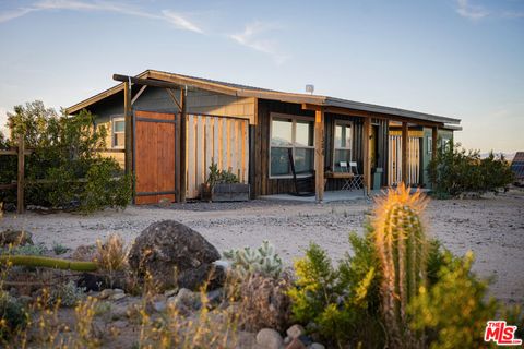 Photo of 1304 Mile Square Road, Joshua Tree, CA 92252 (MLS # 26669887)