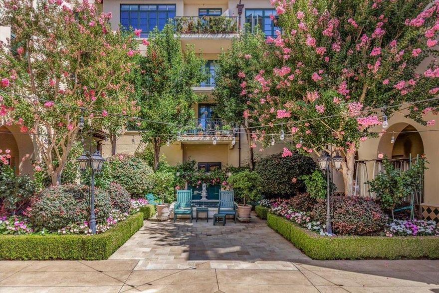 Wonderful location at The Hamilton- Palo Alto's luxury 55+ community in the heart of Downtown Palo Alto.  In this corner unit every room overlooks a private wrap around garden featuring mature landscaping and multiple patio areas.  It has three bedrooms and two full bathrooms, with ample storage space.  Other features include: central air conditioning, new flooring, a gas fireplace and and french doors that open to patio space.  Residents enjoy access to community facilities, including an indoor pool, and spa , 24 hour front desk, access to gourmet dinners served 5 days a week, gorgeous library, shared guest rooms for overnight visitors,  access to a driver, and other planned activities.  Dues shown are for one person, if two people, dues are higher.  If residents are a fall risk they can wear an alert bracelet that will alert the 24 hour staff immediately.