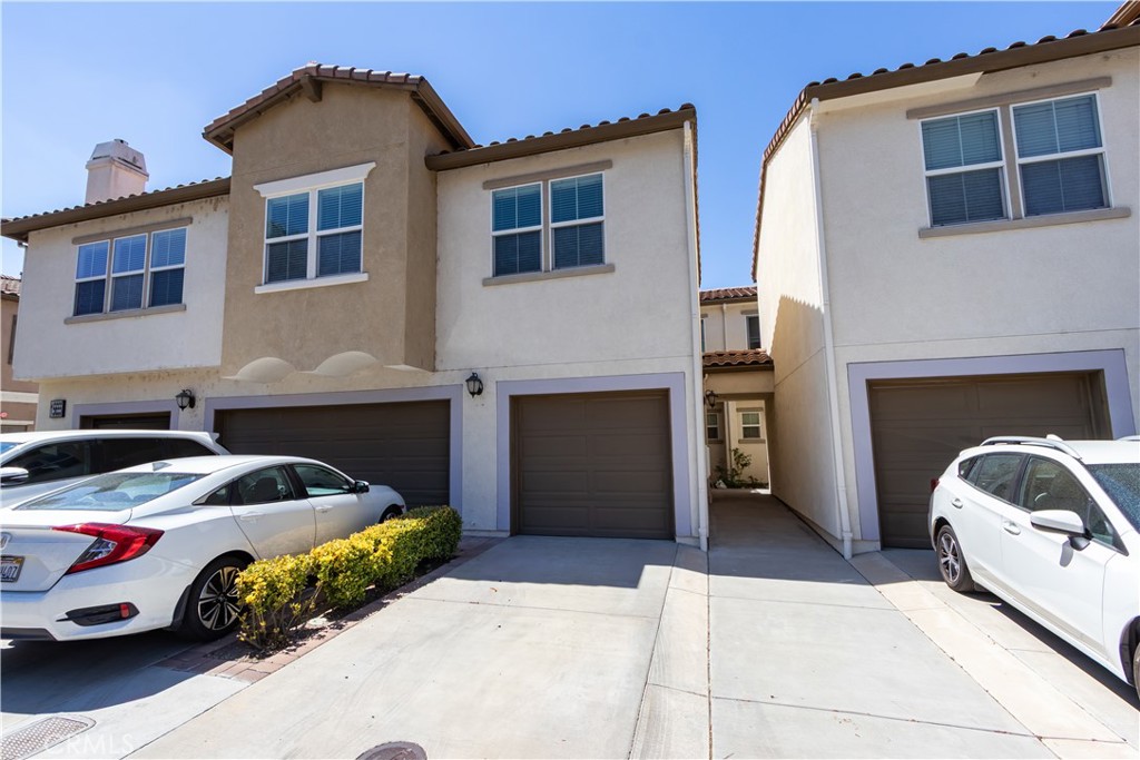 Welcome to Desirable Vista Del Lago Condominium. This well maintained unit has 3 bedrooms and 2.5 Bathrooms. The back balcony area offers views of the mountains and the lake! Open floor plan with large great room centered by fireplace, laminate and tile flooring downstairs. Open kitchen has plenty of cabinets, brand new sink and brand new white counter tops. and a big walk in pantry. Master bedroom also offers a view of Elsinore lake and mountains, full upgraded bath and separate shower, walk in closet appliances washer, dryer refrigerator are included in the sale. One attached garage and indoor laundry room. Located just minutes away from 1-15, enjoy close proximity to local shopping and dinning.Association pool and spa, and a play ground for kids. don't miss the opportunity to own a place in a growing and vibrant community.