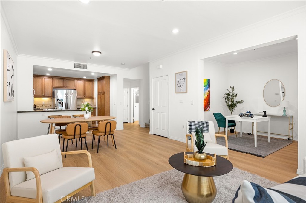 Welcome to this bright and stylish two-story condo in Playa Vista’s sought-after Tempo community. This two-story condo offers 1,410 sq ft of well-designed space with brand-new waterproof flooring and fresh interior paint throughout. Featuring 2 spacious bedrooms, 2.5 bathrooms, and a versatile first-floor den/office that can serve as a third bedroom.
The open-concept main level includes a modern kitchen with granite countertops, full tile backsplash, and stainless steel appliances, flowing seamlessly into the dining and living areas. Upstairs are two en-suite bedroom suites, separated by a conveniently located laundry area.
Additional highlights include central A/C and two side-by-side underground parking spaces. This building offers use of the Center Point Club with swimming pool, screening room, a lounge with outdoor patio, business center and conference room and the Great Room with kitchen for parties. Prime location just steps from Concert Park, coffee shops, grocery stores, and Playa Vista Elementary. Easy access to the beach, LAX, and all the amenities Playa Vista has to offer—pools, parks, fitness centers, restaurants, and more.
