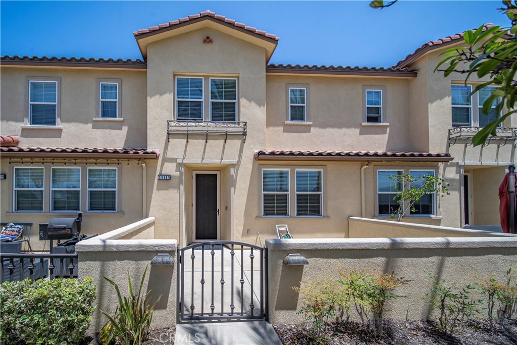 Welcome to The Villages at Heritage Springs – A Hidden Gem in Santa Fe Springs! Step into this beautifully maintained two-story townhome offering 2 bedrooms, 2.5 bathrooms, and approximately 1,400 square feet of thoughtfully designed living space. Each generously sized bedroom features its own en-suite bathroom and walk-in closet, providing privacy and convenience for all. The open-concept living and dining area creates a warm and inviting atmosphere—ideal for entertaining guests or enjoying a cozy night in. The well-equipped kitchen boasts ample counter space, plenty of storage, and a functional layout perfect for everyday living. Additional highlights include recessed lighting, a downstairs guest bathroom, upstairs laundry area, and direct access to a two-car attached garage. Enjoy a charming private front patio perfect for relaxing or container gardening. Located in a secure, gated community with a low HOA, residents can take advantage of outstanding amenities including a sparkling swimming pool, BBQ areas, a playground, and a basketball court. With easy access to shopping, dining, major freeways, and local entertainment, this home truly has it all. Don’t miss your chance to live in one of Santa Fe Springs’ most desirable communities!