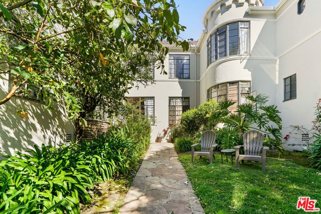 Absolutely stunning 1-bedroom, 1-bathroom home offering 1,000 sq ft of modern living in the heart of Los Feliz. Perfectly situated on a tree-lined street, this residence combines style, comfort, and convenience. The open floor plan features a designer kitchen with custom cabinetry, quartz countertops, and stainless steel appliances ideal for both everyday living and entertaining. Natural light pours through the floor-to-ceiling living room windows, highlighting the beautiful hardwood floors and recessed lighting throughout. The spacious bedroom provides a relaxing retreat, while the beautifully remodeled bathroom boasts a double vanity, tub/shower combination, and elegant designer tile. Additional highlights include in-unit laundry with a newer washer and dryer, as well as a split AC/heat system for year-round comfort. Parking in1 gar garage included. Don't miss the opportunity to call this sophisticated Los Feliz gem your new home. Schedule a showing today!