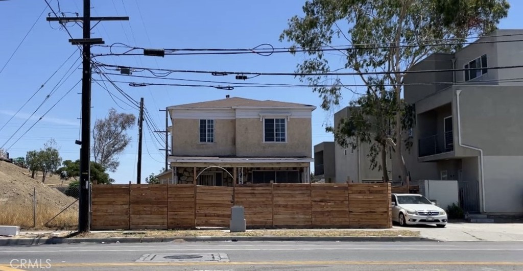 This duplex combines urban convenience with practical living flexibility. Featuring owner-occupancy potential and rental income opportunities, it’s an excellent choice for first-time buyers, investors, or multi-generational households. Large unit has 4 bedrooms and smaller unit has 1 bedroom, the layout offers versatile possibilities to suit a variety of needs. Located in South Los Angeles, a community known for its rich cultural diversity and ongoing revitalization, the property is surrounded by shopping, dining, and local amenities. With key transit options and easy access to the 105 & 110 freeways, commuting to DTLA, LAX, beaches, and entertainment hubs like Crypto.com Arena and SoFi Stadium is effortless. Just steps from the Avalon Green Line Station, this duplex offers hassle-free public transit and strong potential for long-term appreciation. SOLD AS-IS.