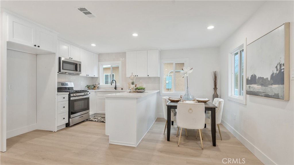 Most affordable upgraded single family home in all of Alhambra!!!
This beautifully remodeled 3-bedroom, 2-bathroom home offers a perfect blend of modern upgrades and timeless design. Every detail of this property has been carefully updated to provide comfort, style, and peace of mind.
The home has been re-wired and re-piped, ensuring efficiency and reliability for years to come. The kitchen has been upgraded with sleek white shaker cabinetry, stunning quartz countertops, and stainless-steel appliances. Its open layout flows seamlessly into the dining and living areas.
Both bathrooms have been beautifully redesigned with high-end finishes. The master bathroom features a modern walk-in shower with chic subway tiles and black hardware, while the secondary bathroom offers a pristine shower/tub combo, catering to both style and functionality. Throughout the home, brand-new vinyl windows invite in an abundance of natural light, highlighting the warm lvp flooring that ties the space together.
This property is ready for you to call it home! If you’re looking for a modernized home with timeless appeal in Alhambra, 802 S Olive Ave is ready to welcome you.