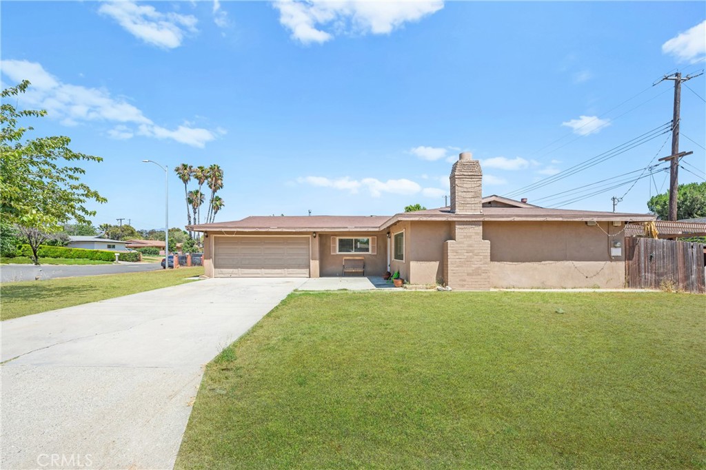 Beautiful single-story home loaded with upgrades and completely move in ready! This one of a kind property offers fantastic curb appeal. Step inside to a tile entry and an open floor plan featuring a formal dining area highlighted by a chandelier and a slider that lead to a private backyard with new fencing, a paver patio, and space perfect for entertaining. The upgraded kitchen showcases like new white cabinetry, stainless steel appliances including a gas stove, microwave, dishwasher, and refrigerator, all complemented by stunning countertops, tile backsplash, and tile flooring. All bedrooms are equipped with ceiling fans, and updated sliding closet doors, with stylish window shades throughout. The guest bathroom features a vessel sink, granite countertop, custom tile shower, updated faucets, and a glass shower door. The primary bathroom offers a custom-tiled tub, new vanity with a vessel sink, granite countertop, and upgraded fixtures. Additional upgrades include all new interior doors and lighting, central heating and A/C, and professionally installed front and back yard sprinkler system. The home also features an attached two car garage with an automatic door, perfect to convert into a JR ADU in the future, potential for RV parking. Don’t miss this incredible opportunity!