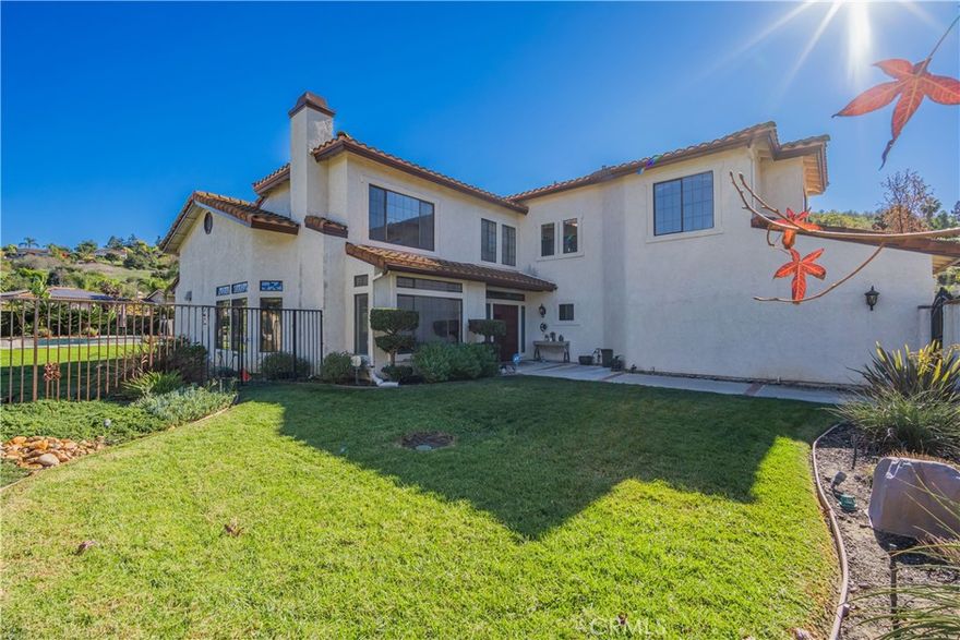 First time on market! This magnificent UPGRADED home located in "South Hills” area. It features 4 bedroom, 4 baths plus a large bonus room. The luxury master suite located on the MAIN FLOOR with fireplace, double walk-in closet, double sink bathroom, jacuzzi and shower. Second floor features 3 bedrooms 2 full bathrooms and a large bonus room with fabulous mountain view. Upgraded electrical, plumbing, newer water heaters, newer HVAC system, epoxy garage floor, insulated garage doors, hardwood flooring, and more. The roof underlayment was replaced in 2024. Living room with fireplace and connect to the dining room perfect for hosting family and friends. Large kitchen with stainless steel appliances and granite countertops. Cozy family room with fireplace and nicely designed wet bar. Large ALL FLAT private front/backyard completed landscaped with beautifully upgraded pool/spa, patio and many citrus trees. Close to golf course/ country club, shopping center, restaurants, parks , schools, and easy exit to 10 freeway. Cal-Poly Pomona and MT. San Antonio College  just a few minutes away. This beautiful & exclusive home is ready for its next chapter.