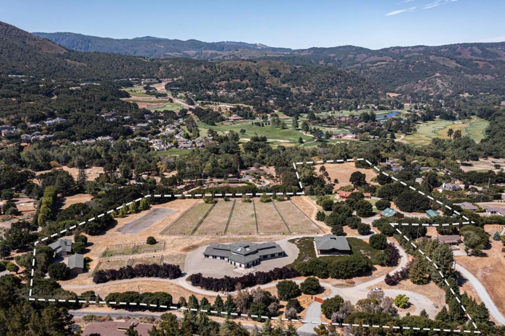 Introducing a stunning equestrian compound in a highly desirable mid-valley location with river frontage on 3 lots of record with over 19 acres of flat, usable space. The property enjoys a wonderful balance of sun with a breeze and easy access to all of the Peninsulas amenities. Crossing through the gated entrance you are transported to your own world, just minutes from downtown Carmel, golfing at world-famous Pebble Beach Resort, or wine tasting in Carmel Valley. The property has 3 wells and incredible horse facilities, with turnouts, large stable with office, lunging arena, and grazing space. The stylish main house offers an easy place to use as a full-time or vacation residence, and the greenhouse, currently used as an indoor-outdoor living space, could serve a variety of purposes. The three-bedroom caretaker house is ideal for housing guests, a source of additional income, or housing for full-time help. This is a highly unique opportunity in an ideal location ready to be enjoyed.