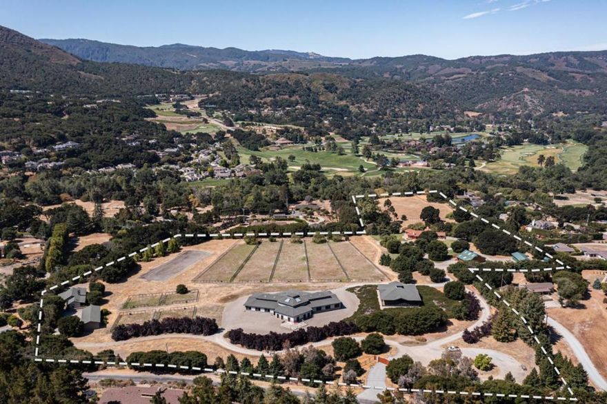 Introducing a stunning equestrian compound in a highly desirable mid-valley location with river frontage on 3 lots of record with over 19 acres of flat, usable space. The property enjoys a wonderful balance of sun with a breeze and easy access to all of the Peninsulas amenities. Crossing through the gated entrance you are transported to your own world, just minutes from downtown Carmel, golfing at world-famous Pebble Beach Resort, or wine tasting in Carmel Valley. The property has 3 wells and incredible horse facilities, with turnouts, large stable with office, lunging arena, and grazing space. The stylish main house offers an easy place to use as a full-time or vacation residence, and the greenhouse, currently used as an indoor-outdoor living space, could serve a variety of purposes. The three-bedroom caretaker house is ideal for housing guests, a source of additional income, or housing for full-time help. This is a highly unique opportunity in an ideal location ready to be enjoyed.