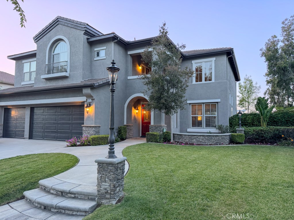 ***A True South Corona Gem*** Tucked away on a quiet cul-de-sac in one of Corona’s most desirable neighborhoods of Amberhill, this beautifully maintained home offers the perfect blend of comfort, style, and outdoor living.
This home is ideally located within walking distance to local parks and the highly rated Susan B. Anthony Elementary School, making it perfect for families or anyone who values convenience and community. Shopping, dining, and freeway access are just minutes away — and for occasional getaways, Orange County, Temecula, and San Diego are all within easy reach.
Step into your private outdoor oasis — thoughtfully designed for entertaining and everyday enjoyment. The massive custom-built patio cover provides plenty of shaded space for lounging and dining. Fire up the authentic wood-burning pizza oven, take a swim in the sparkling pool, or just unwind in the spa under the stars.
The remodeled gourmet kitchen built for serious cooks and entertainers alike. It features a 48” professional-grade range, built-in refrigerator, custom cabinetry, bar-seating island, and a generous layout that opens seamlessly into the main living spaces.
The open-concept family and dining area is anchored by a cozy fireplace and filled with natural light from the backyard. With custom stone and cabinetry in the living room, this combination makes it a great place to entertain or relax.
The spacious primary suite includes a fireplace, luxurious en-suite bath with dual sinks, soaking tub, and a separate tiled shower.
Additional bedrooms are roomy. The north facing bedroom is equipped with a full bathroom, and the other 2 second story bedrooms share a jack and jill bathroom, perfect for kids, family, and guests. The home is equipped with a home office connected to a full bathroom.
Additional Features Include a 3-car garage, indoor laundry room with utility sink & cabinet storage, dual central AC and heating.
If you’re looking for a turnkey home in a prime South Corona location with a standout backyard and chef’s kitchen, this home is ready to impress.