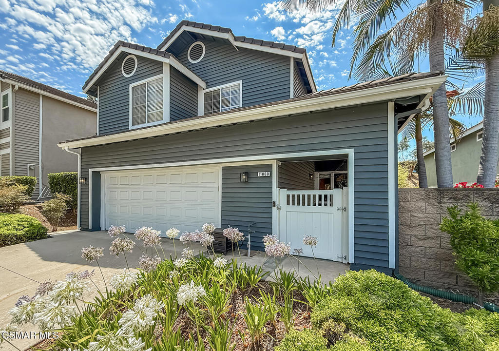 Discover your dream home in the highly sought-after Quail Run neighborhood, nestled within the esteemed Moorpark Unified School District. Enjoy the benefits of a low Homeowners Association (HOA) that includes access to a sparkling community pool and spa, along with convenient front yard maintenance. This stunning two-story residence boasts an inviting floorplan designed for both comfort and elegance. As you step inside, you'll be greeted by a spacious open living room featuring soaring vaulted ceilings, custom shades, and a sliding door that seamlessly connects to the backyard, perfect for embracing an indoor-outdoor lifestyle. The adjacent formal dining room, accessible through charming French doors, offers versatility for privacy - ideal for use as a home office, exercise room, or creative space. The heart of this home is its beautiful kitchen family room, showcasing sleek black granite countertops and modern stainless steel appliances. A delightful dining area by two windows fills the space with natural light. The kitchen flows effortlessly into the cozy family room, which also includes a sliding door leading to the yard. Additional conveniences include a powder room on the main floor and a spacious two-car attached garage with custom built-ins. Throughout the home, luxurious vinyl flooring adds a touch of sophistication. Upstairs, retreat to the expansive primary bedroom, complete with generous closets and an en-suite bathroom that features a double vanity, a large sunken tub, and a separate shower for your relaxation and convenience. Down the hallway, you will find two generously sized bedrooms with a double vanity bathroom. Step outside to your private, low-maintenance backyard, brimming with possibilities for vibrant flower beds and productive vegetable gardens. The buildable hillside is ready for stairs and a deck. Enjoy the many fruit trees - mandarin in the front yard, lemon, apple,pomegranate, and avocado in the side yard This property is located directly across from the community pool and spa allowing for an open and spacious view from the front of the home. The home is just moments away from top-rated schools, shopping venues, parks, freeways, and a variety of dining options. Don't miss out on this incredible opportunity- this home offers the perfect blend of style, comfort, and convenience. Make it yours today!