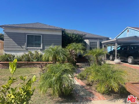 Photo of 11143 Ruthelen Street, Los Angeles, CA 90047 (MLS # 25607879)