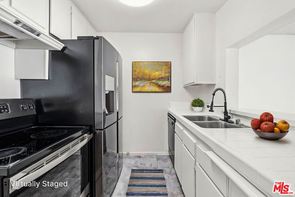 Photo of 5460 White Oak Avenue #A204, Encino, CA 91316 (MLS # 25585769)
