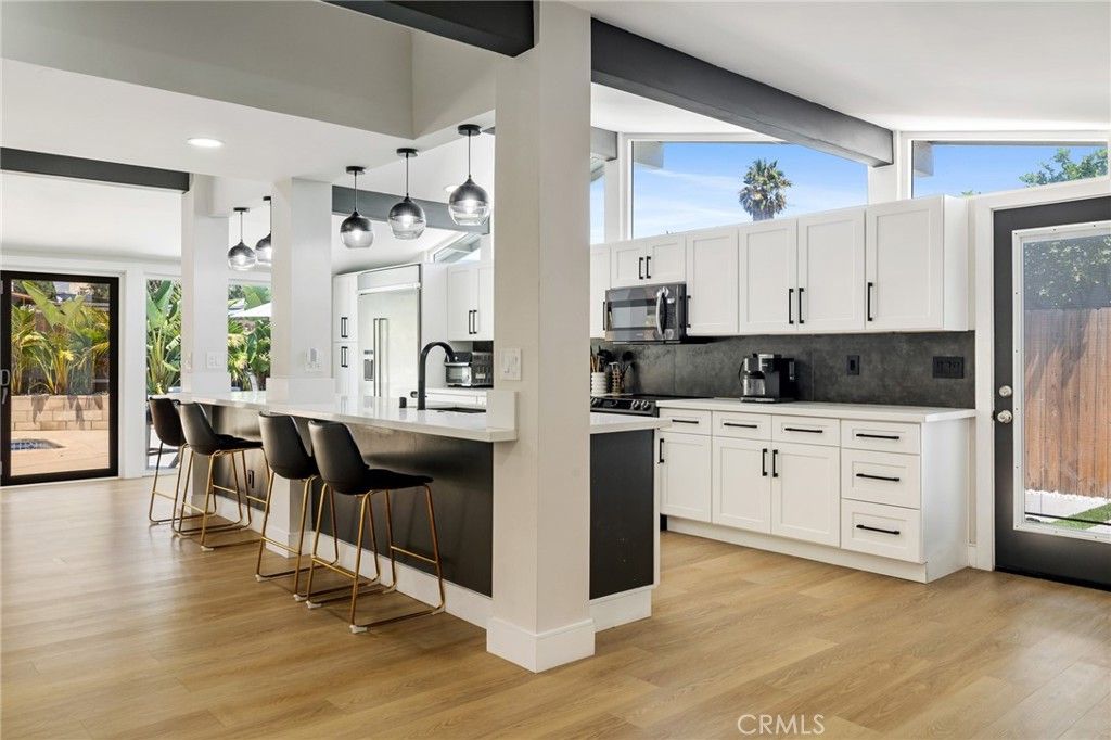 Photo of 19945 Gresham Street, Northridge, CA 91324 (MLS # SR26057007)