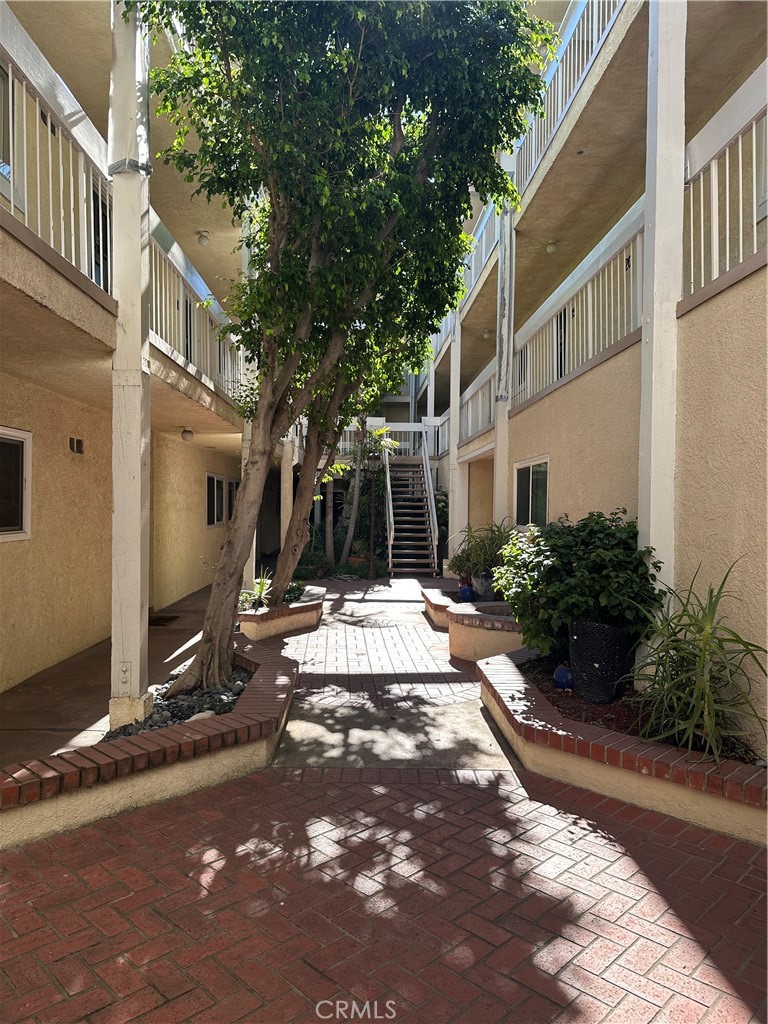 This Charming condo is located in the desirable community of Riverside Townhomes*End Unit in a well maintained complex*Little TLC will make this condo a GEM*Bedrooms are spacious with lots of closet space*White Shutters throughout the condo*Living Room with recessed lighting and glass slider leads to large patio with lots of privacy*Grassy Area behind Patio wall provides a buffer between the Main Street and Patio to reduce noise*HOA provides a pool area to relax on a sunny day*Condo includes an assigned Tandem parking space for 2 vehicles located near the unit with a large private storage area, and easy access through the front of the building. There's also plenty of street parking available for guests.Just minutes from NBC, Disney, CBS, Warner Bros., and neighborhood favorites like The Shops at Sportsmen's Lodge, Ventura Boulevard, and the Studio City Farmers Market, this condo places you in the heart of it all with easy 101 Freeway access.