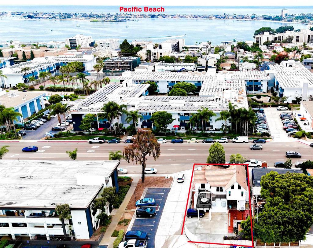 Great property opportunity located in Crown Point! Located within walking distance to shops, dining, and the beach. 5 Blocks to the Ocean, perfect for someone who would like to live in Pacific Beach but can use rental property with existing tenants in place to help with mortgage. This is one building that currently is being used as 3 units. The upstairs unit has beautiful vaulted ceilings, with 2 bedrooms 2 bathrooms, the larger unit downstairs has 3 bedrooms 2 bathrooms and there is also a 1 bedroom one bath apartment unit with its own kitchen and bathroom. All new exterior stucco done with permits and all new concrete driveway in back of property that can easily fit 5-6 cars. Property has alley access. Buyer & buyers agent to verify year built, exact building SQFT, building permits.