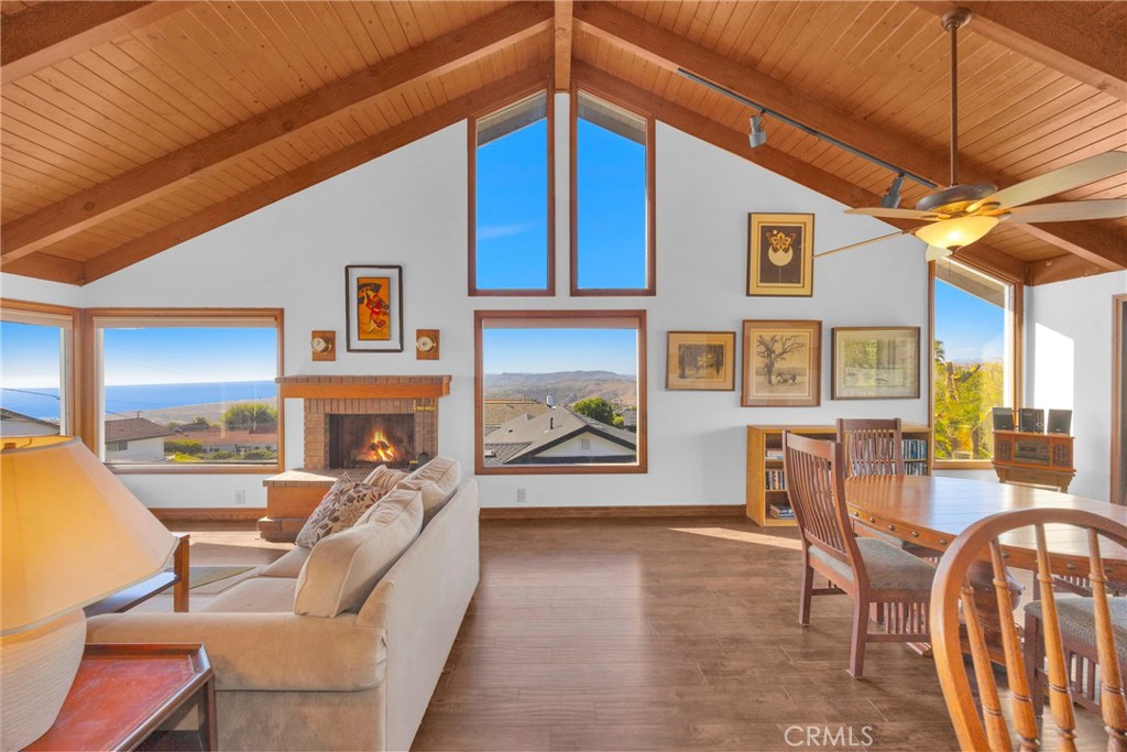 Unmatched Panoramic Ocean & Mountain Views in San Clemente
Perched high on the hills of San Clemente, this spacious home delivers what every buyer dreams of: sweeping sit-down ocean views that few properties can match. From Dana Point Harbor to Catalina Island, San Clemente Island, Palos Verdes, Saddleback Mountain, and even Mt. Baldy, this home offers more than 180 degrees of breathtaking views. Sunrises, sunsets, city lights, and sparkling ocean are all yours to enjoy daily.
With over 2,400 square feet of living space, this 4-bedroom, 3-bath property combines size, function, and flexibility. The main level features a desirable primary suite, along with a large living room that opens to the backyard and frames the mountain views. Upstairs, three more bedrooms capture views from every angle.
The crown jewel is the expansive bonus or game room upstairs. Already designed with a fireplace, wet bar with sink and refrigerator, and its own private bath, this space can remain the ultimate entertainment retreat or be transformed into a second primary suite. The layout is perfect for multi-generational living, offering private quarters for extended family, in-laws, or guests. Imagine waking up to Catalina Island and Dana Point Harbor from your own upstairs suite.
The large backyard adds even more appeal. With plenty of flat, usable space, it is ideal for a pool, outdoor kitchen, or putting green. A rock waterfall feature is already in place, creating a tranquil setting for entertaining or relaxing.
Additional highlights:
Newer roof and many upgrades
No HOA and no Mello Roos for more freedom
Quiet, established neighborhood with privacy
Oversized lot with room to expand
Every room offers views and abundant light
The location is unbeatable. Centrally located in San Clemente, this home is just minutes to downtown shops and restaurants, the Pier, Dana Point Harbor, Trestles surf, and the Metrolink station.
Homes with this caliber of panoramic views rarely combine this square footage and lot size at this price. This property offers tremendous value, and with the right finishing touches, it has the potential to become one of the most impressive homes on the hill.