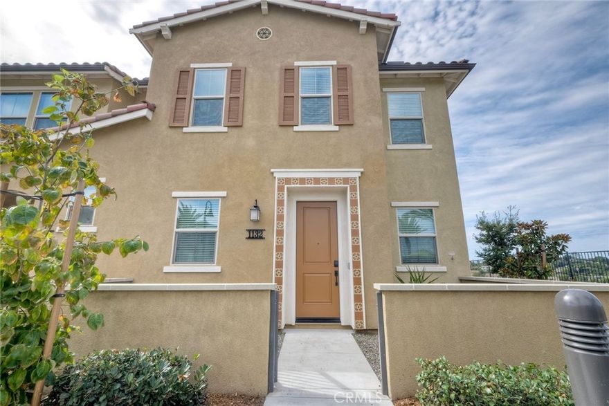 Welcome to The Peak gated resort community located walking distance to shops, restaurants, schools, & Botanical Gardens. This new community is also close proximity between the 76,78, and 15 freeways. An additional perk is that it is VA/ FHA approved and no Mello Roos. Energy efficient upgrades include dual-paned windows, designer blinds, LED lighting, tankless water heater, solar panels, and whole house fan for improved air quality. Its open concept boasts high ceilings, natural lighting and rooms that blend seemingly to give a grand first impression. The home is lined with luxury tile flooring and freshly painted interior. Kitchen include stainless appliances, quartz counters, designer backsplash. As we enter the second level, there are four bedrooms with the master suite showcases dual sinks and large walk-in closet. The laundry room is also located upstairs and offers both gas/electric washer/dryer included. A bonus feature is the prime location with amazing views of the city. For downtime and relaxation, this home is a short walk across to a resort-style pool/spa, fire pits, and multiple BBQ stations for the ultimate California lifestyle. This home is IMMACULATE and move-in ready!