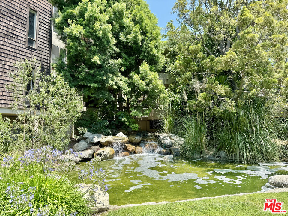 One-of-a-Kind Top-Floor Studio for Lease at The Courtyards of West Hollywood. This beautifully updated corner unit offers resort-style living in the heart of West Hollywood. Located on the top floor, the studio features a covered private balcony overlooking a serene waterfall, providing a peaceful retreat above the city.Interior upgrades include hardwood floors, a custom Italian-designed kitchen with Miele stainless steel appliances, granite countertops, recessed lighting, an updated bathroom, a custom-built closet, and additional storage space.Situated on the desirable Kings Road side of the building, this light-filled corner unit offers both privacy and charm.The Courtyards is a gated community with outstanding amenities, including a pool, spa, sauna, gym, recreation room, library, on-site management, and 24-hour security. Includes one parking space and gas and water. Available August 1st.