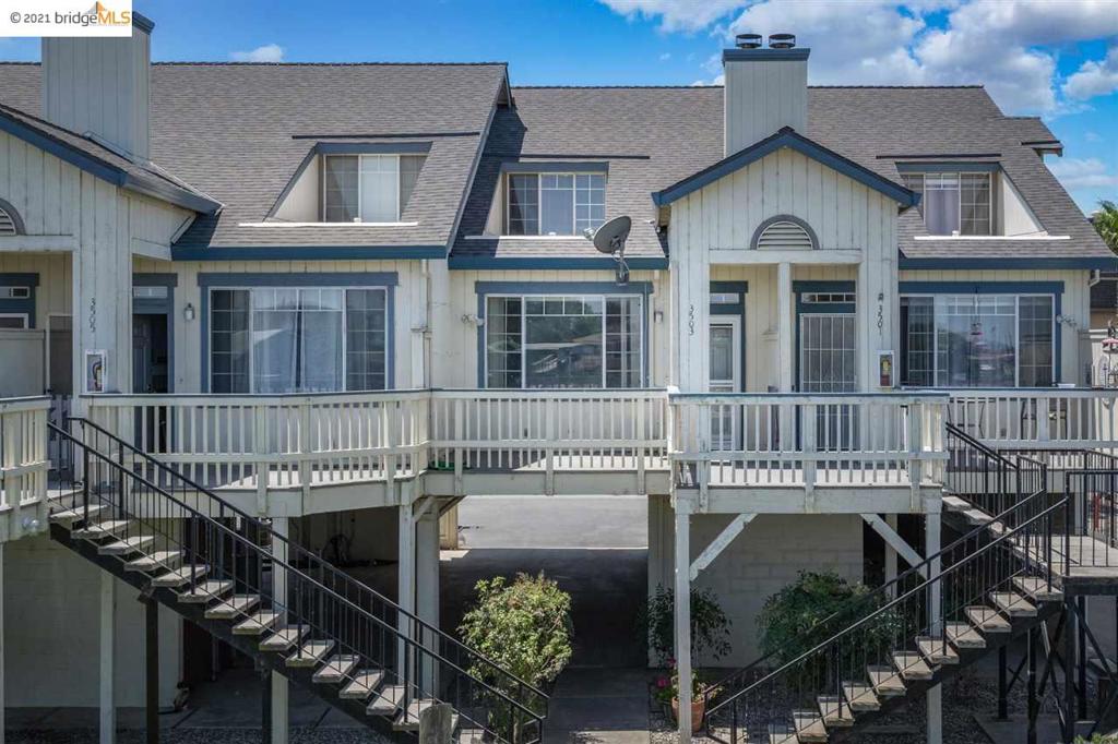 Vacation, resort-style living on the Delta in this lovely two-story condo with relaxing water views from the front and master bedroom window and a fireplace to warm by while enjoying the view. Also included with this 2 bedroom/2 bath beauty is a covered boat berth to store your favorite water vessel for delta water fun. For additional recreation, enjoy the community pool, tennis courts, and recreation room. This gated community offers a security entrance, locked storage area and two carport parking. Fresh interior paint throughout and new living room carpet. What a great place to call home!