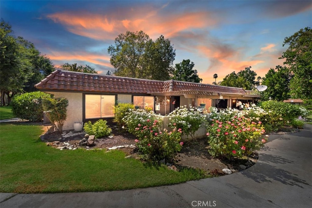 Welcome to the highly desirable Victoria Village Community! This beautifully maintained condo offers 3 bedrooms, 2 bathrooms, and approximately 1,300 sq. ft. of comfortable living space. A charming covered front porch framed by a gorgeous rose garden sets the tone as you enter. Inside, you’ll find a bright and open floor plan featuring a spacious living room with a slider leading out to the front porch—perfect for relaxing or entertaining. The kitchen has Corian countertops, ample cabinet space, modern appliances including refrigerator, gas range, and microwave, with tile flooring. Convenient indoor laundry is also included. The primary suite features a beautifully updated private bath, while two generously sized guest bedrooms share a full hall bathroom. Additional upgrades include ceiling fans, a newer water heater, and an updated HVAC system with newer heater and ducting for comfort and efficiency. This home also comes with a 2-car detached garage with easy access. Enjoy the wonderful community amenities—pool & spa, clubhouse, tennis courts, and basketball courts—all within Victoria Village. Park-like grounds. Ideally located close to highways, schools, and shopping. Don’t miss your chance to make this inviting home your own!