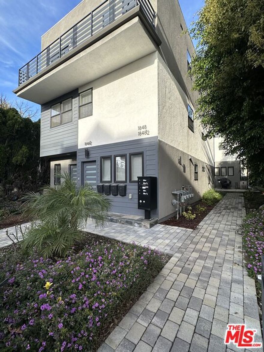 Brand new construction in 2020, this 4 bedroom/4 bathroom apartment is perfect for several roommates or tenants looking for adequate space.  The property includes (4) units, with 1848 1/2 being on the back half of the property and off the street.  Kitchens and bathrooms come with quartz counters, recently new appliances, and plenty of cabinets and counter space.  The apartment has laminate flooring throughout (except tile in bathrooms) so pets are acceptable.  The separation of spaces is great, with a bedroom on the ground level, one bedroom on the middle level, and two bedrooms on the top floor.  Three of the bedrooms have private corner balconies.  Each unit in the building receives two (tandem) parking spots in the rear carport with alley access.  Privately owned and managed, this small complex provides a home-like feel for tenants in a convenient West-LA location....close to Sawtelle dining, freeway access and community parks, but still close enough to the coast.