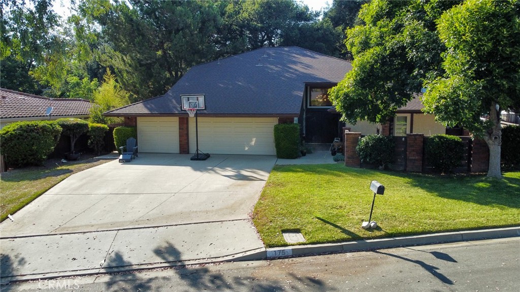 Nestled in a quiet cul-de-sac just north of Garey Avenue, this 4-bedroom, 2.5 bathroom home offers a blend of comfort and convenience. Recent upgrades include new vinyl windows and sliding glass door, as well as updated wood, laminate, and carpet flooring. The spacious layout includes well-sized bedrooms and multiple living areas. Enjoy a serene front yard koi pond with three mature koi fish. Located near top-rated schools, shopping, dining, and with easy access to the 210 freeway—this home is a must-see!