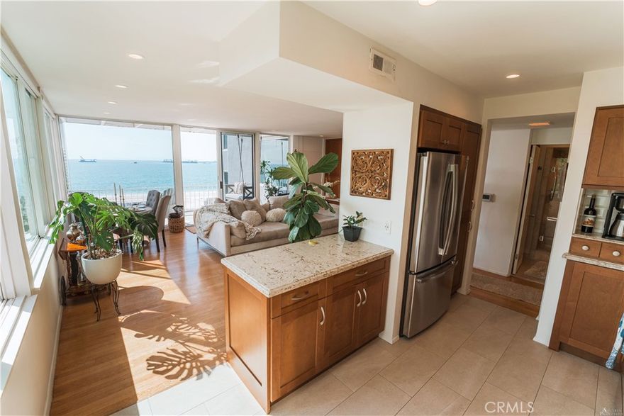 Looking for a beautiful, spacious unit with an unobstructed view of the Pacific Ocean, the Queen Mary, the Belmont Pier, and the Catalina Island?  How about a full-size balcony to enjoy the coastal weather?  Would you like private access directly to the beach from the comfort of your community, and one of the lowest HOA fees in the Belmont Shore area?  You may have found the perfect place to call home if so!  Plenty of free street parking is usually available due Bluff Park across the street for guests and friends to enjoy, and there are lots of places to eat, drink and shop on the famous Second Street--all within walking distance.  This area has low congestion and a very residential feel.  The fantastic floorplan has been upgraded throughout with artisan features.  It also boasts ample storage for all your belongings and collectables.  The amount of natural sunlight entering this corner unit is incredible, and the dual pane windows will keep you comfortable year-round.  The privacy factor is unmatched for the area with no neighbors able to look inside.  Calling this place home feels like a year-round vacation, and in this extremely low turnover community the opportunity for you to move in is open—don't miss it!