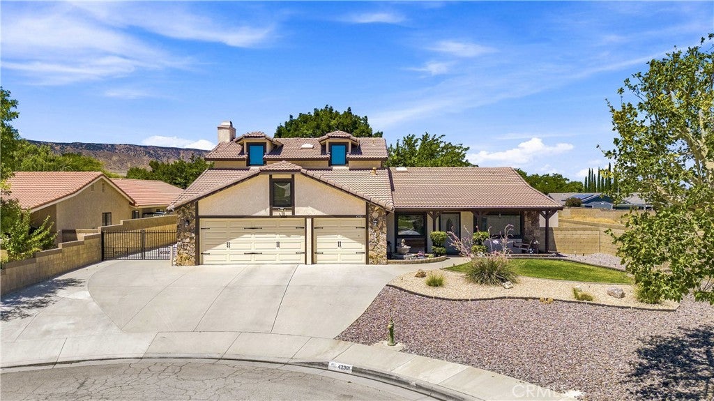 Photo of 42301 Woodstone LN, Lancaster, CA 93536 (MLS # SR26151341)