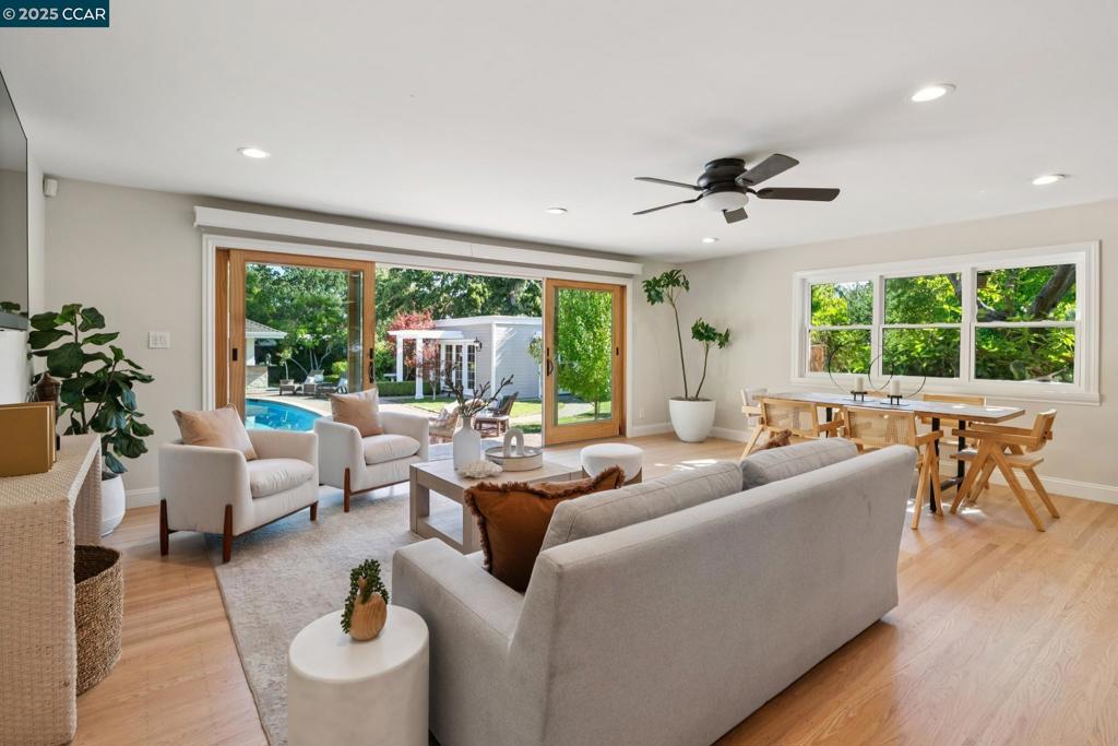 California Living at Its Finest – Indoor/Outdoor Oasis with guest house Welcome to this beautifully updated single-level home, offering the ultimate in California indoor-outdoor living. Situated on a generous 12,320 SqFt flat lot, this 1,636 SqFt residence (public record) and detached 500 SqFt (buyer to verify) guest house with a full kitchen, bathroom, and private entrance—ideal for guests, extended family, art studio and/or work. Blends style, space, and functionality—perfect for entertaining or relaxing in your private retreat. Step outside into your own backyard oasis, featuring a sparkling pool, hot tub, three lush grass play areas, and a stunning covered cabana outfitted with a built-in electric-start gas fireplace, gas BBQ, sink, and refrigerator. Enjoy refreshments and your favorite shows on the large screen TV with Sonos speakers while gathering with friends and family in this resort-style setting. Inside, the home boasts 3 spacious bedrooms and 2 fully updated bathrooms. The modern kitchen features a large island and opens to an expansive family room, where sliding glass doors frame an unobstructed view of the incredible backyard, bringing the outdoors in. Whether you're hosting a party or enjoying a quiet evening by the pool, this home has it all.