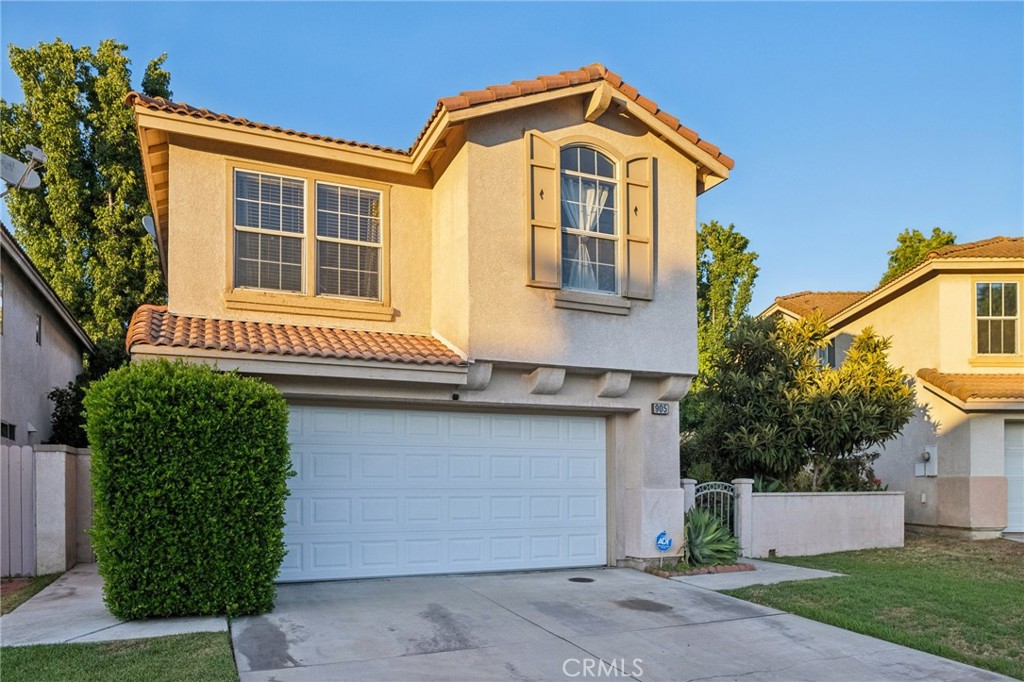 Welcome to your dream home in the gated community of Sunrise Palms in West Covina! This well-maintained two-story residence features 4 bedrooms, 2.5 bathrooms, and a finished 2-car garage with ample storage. High ceilings and natural light fill the formal living and dining areas, creating an inviting atmosphere from the moment you enter. The updated kitchen boasts custom cabinetry and granite countertops, flowing seamlessly into the open-concept family spaces—perfect for entertaining. Upstairs, enjoy a spacious primary suite, three additional bedrooms, and a Jack-and-Jill bath. Step outside to your private backyard with a pergola, surrounded by lime, fig, and apricot trees—ideal for gatherings and relaxation. Community amenities include a sparkling pool and spa, and a low HOA of $188/month. Conveniently located near schools, supermarkets, and the West Covina Haven Market—this is one you don’t want to miss!