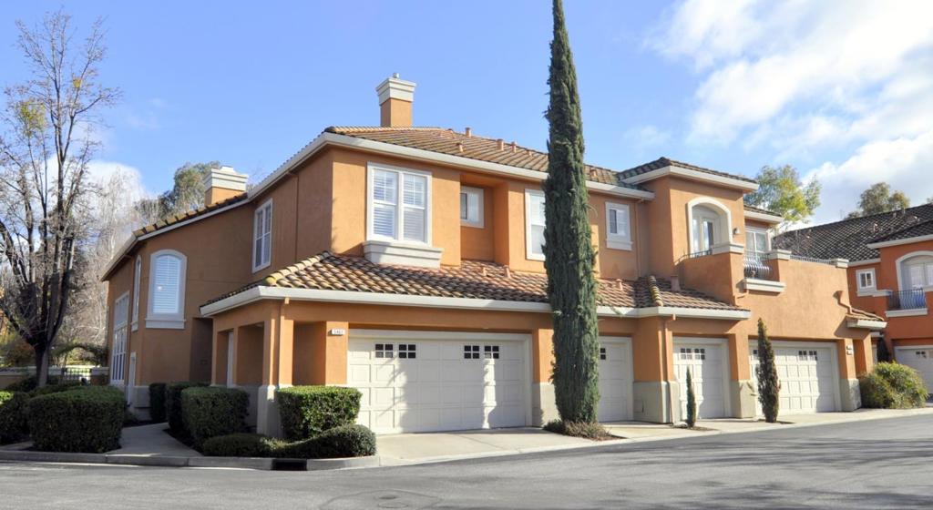 Styled to perfection, this Riviera Carrera condominium inside Silver Creek Valley Country Club is truly special. With windows on 3 sides and a townhome-style first and second level floor plan, this home lives like a single family residence. Custom interior finishes have been completed that create a home of comfort and elegance. Newer cabinetry throughout, enhanced hardwood flooring throughout, a gourmet kitchen with stainless appliances and incredible marble detailing in all 3 remodeled baths and the kitchen blend to create the ultimate in luxury. Covered terrace off the master suite is great for quiet relaxation. The spacious back yard brick patio area has plenty of room for outdoor seating and direct views to the lovely park-like permanent HOA open space. Now that most homes inside the Country Club are 25+ years old, move-in condition is rare and sought after. Downstairs bedroom currently shown as an office. Visit this extraordinary residence & prepare to be impressed.