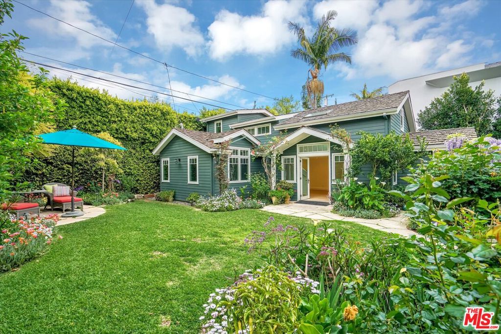 Rear Cottage style house with two bedrooms, two baths, newer construction in 2020 by renowned architect Joan Swartz and custom interiors by designer Alison Kandler, nestled in the north of Montana Ave., neighborhood, in the heart of Santa Monica. This ADU home exudes charm with impeccable construction details throughout. Upon entering the property, you are greeted by the scents of landscaped plantings and lush flowering wisteria, roses, Calle lilies, daisies, jasmine, and grassy small yard. A flagstone walkway leads you to clear glass double door entry with skylight above, shedding the natural sunlight into the first floor living space. A traditional L shape kitchen with quartz countertops, custom blue sky backsplash tiles, crisp white timeless shaker custom cabinetry, GE Monogram refrigerator, microwave and environ friendly electric range. Living room with media cabinet (pre-wired wall for TV) and small dining area, recessed lights on dimmers and unique light fixtures add a luxurious feel of the space - not your standard cookie-cutter construction. Adjacent to the kitchen, is a well-equipped laundry room with accent wallpaper, plenty of built-in cabinets, and side by side washer-dryer. First floor bedroom with vaulted ceilings, remote ceiling fan and bonus room (office or sitting room) with full bathroom. Second bedroom is upstairs, with pitched ceilings, operable skylights, recessed lighting, several closets, plus linen closet and full bathroom. Additional enhancements include transom windows, luxury vinyl plank flooring, custom blinds, plantation shutters, black out blinds, full-size washer/dryer, two luxury bathrooms with large shower, closet with organizers and chest of drawers, double pane windows, heat and A/C mini split system, ample storage in clever tuck-a-way areas and exterior accent lighting. Utilities included in rental fee are water, trash, gas, electricity, and gardener. Many more details! A special opportunity to rent a newer constructed rear ADU home in the prestigious Gillette Square neighborhood, north of Montana Avenue in Santa Monica.