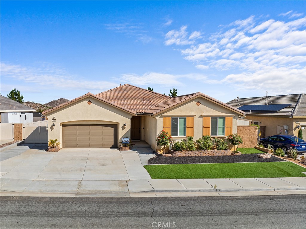 YOUR NEW HOME AWAITS! Discover unparalleled comfort and sophisticated living at 29167 Moraga Street, a truly exceptional rental opportunity nestled in a vibrant Menifee neighborhood. This meticulously upgraded home, offers a generous 2,683 square feet of thoughtfully designed living space, featuring five spacious bedrooms and 3 luxurious bathrooms and a half bathroom. From the moment you step inside, you are greeted by an expansive open floor plan adorned with brand-new luxury vinyl flooring, creating an inviting atmosphere that seamlessly blends modern elegance with everyday functionality. The heart of this magnificent home is its gourmet kitchen, a culinary haven boasting an oversized island, exquisite quartz countertops, upgraded white shaker cabinets, and top-of-the-line stainless steel appliances, including a six-burner stove, double oven, and built-in microwave. Recessed lighting illuminates the space, which flows effortlessly into the spacious dining area, perfect for hosting gatherings or enjoying quiet family meals. This residence uniquely offers two primary bedrooms, each designed as a private retreat with ample space and convenience, including sliding doors for enhanced access and comfort. The primary bathrooms showcase modern finishes, with one featuring a newly added window for abundant natural light. Beyond the stunning interior, this home distinguishes itself with significant energy-efficient features, including plenty of solar panels, promising substantial savings on electricity bills. The exterior provides a serene escape with a private, covered patio, ideal for outdoor relaxation or entertaining, and a luxurious above-ground spa for ultimate unwinding. A two-car attached garage provides direct access and ample storage. Located in the thriving city of Menifee, this property offers convenient access to major thoroughfares like the I-215 and I-15 freeways, simplifying commutes throughout Southern California. You'll find yourself just moments away from a diverse array of shopping centers, popular dining establishments, and highly-rated schools, ensuring all your daily needs are met with ease. This is more than just a house; it's a lifestyle opportunity waiting to be embraced. WE DARE YOU NOT TO LOVE IT!