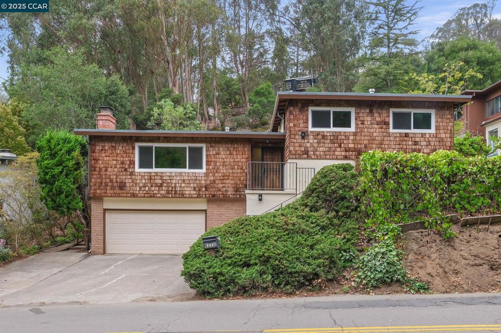Charming Montclair Village Retreat with Easy SF Commute Enjoy the best of both worlds—peaceful small-town living and quick access to the City. This 3-bed, 2-bath home blends Old World charm with modern updates, tucked into a private setting with views of wooded hillsides. Just minutes to Hwy 13, your commute to San Francisco or the greater Bay Area is a breeze. Inside, the light-filled floor plan features spacious rooms designed for both comfort and entertaining. The updated kitchen with stone counters, modern appliances, and dining area opens to a secluded patio—perfect for morning coffee or evening gatherings. Upstairs, the primary suite is joined by two generously sized bedrooms and a refreshed hall bath. Recent upgrades include new luxury vinyl plank flooring, fresh interior paint, recessed lighting, and dual-pane windows throughout. Located only blocks from Montclair Village, you’ll love strolling to cafés, shops, the weekly Farmers Market, parks, and top-rated schools—all while enjoying the warmth of a tight-knit community.